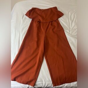 Strapless jumpsuit. Burnt orange, size US 8, wide leg with back zipper.